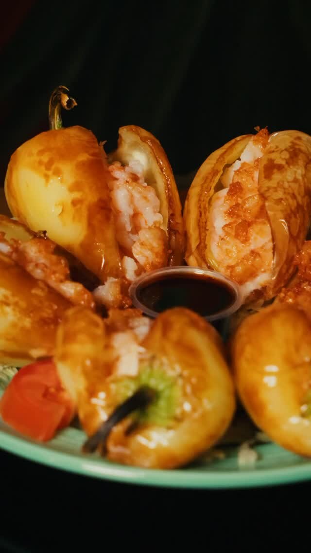 Chiles güeros stuffed with shrimp, with a dipping sauce